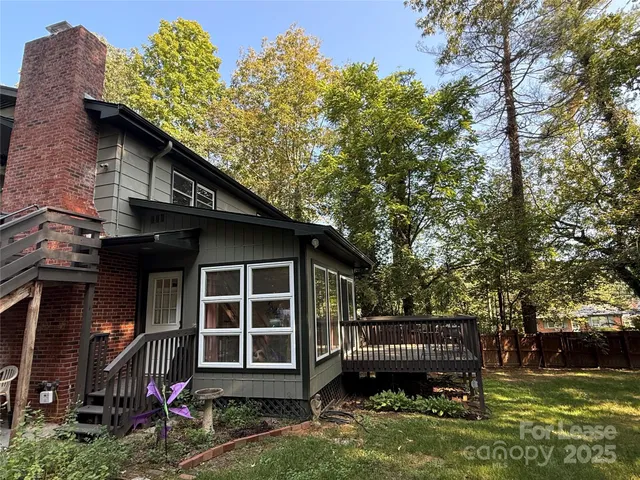 a house view with a garden space
