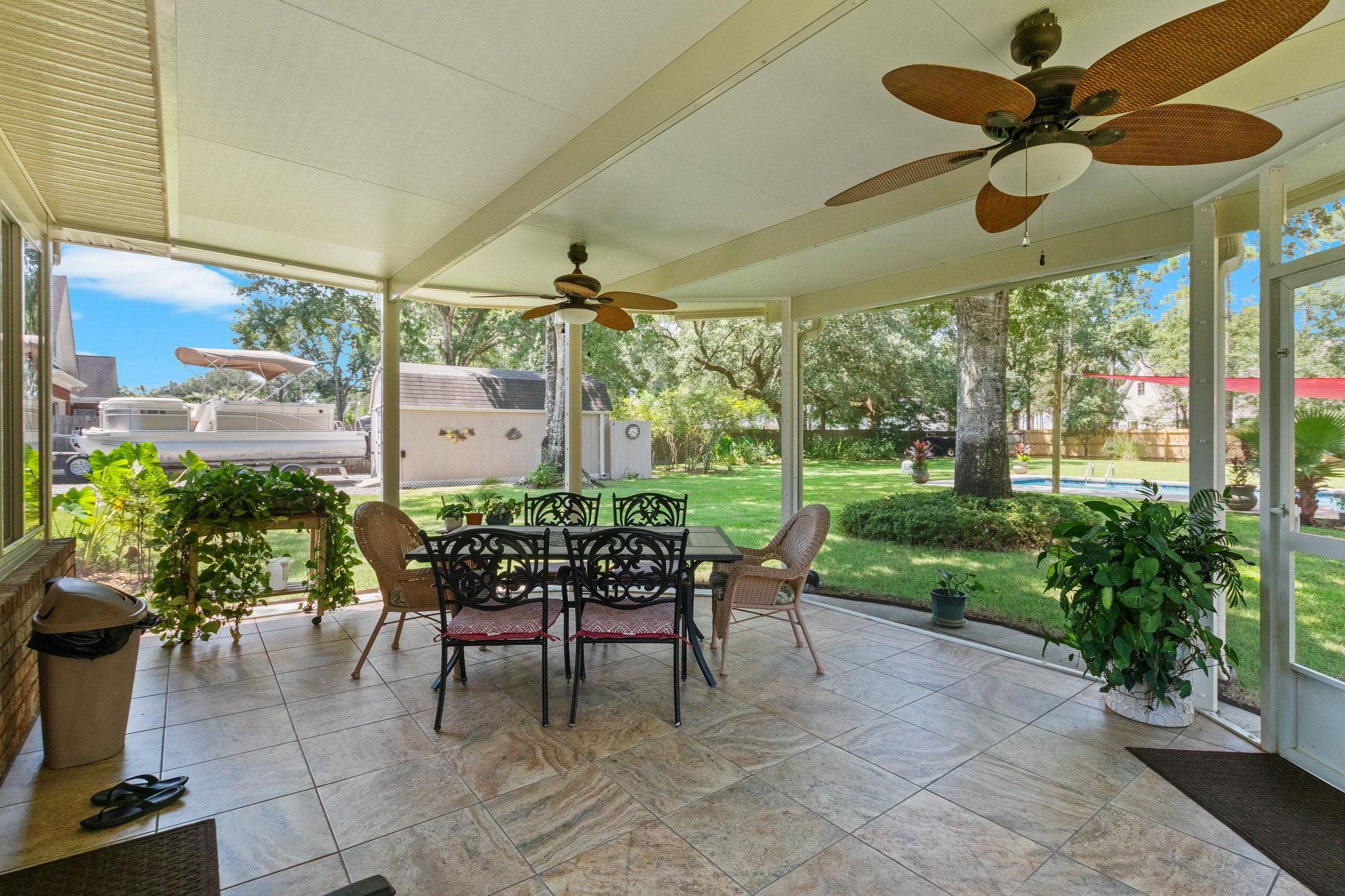 8431 Forest Drive Foley, AL 36535 - Photo 29 of 36 Screened porch