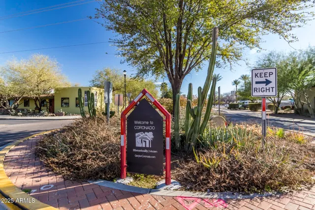 a view of a street with a building