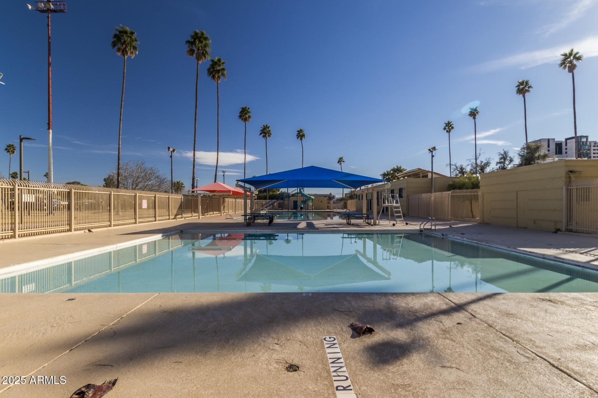 1318 East Culver Street, Unit 1 Phoenix, AZ 85006 - Photo 22 of 26 a living room with furniture and a pool table