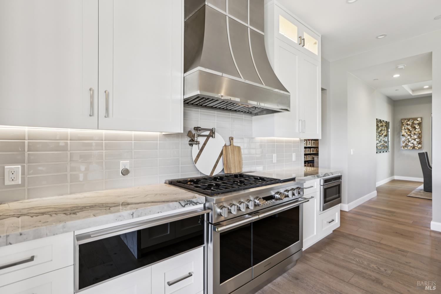 3758 Skyfarm Drive Santa Rosa, CA 95403 - Photo 24 of 80 a kitchen with stainless steel appliances granite countertop a stove and a sink