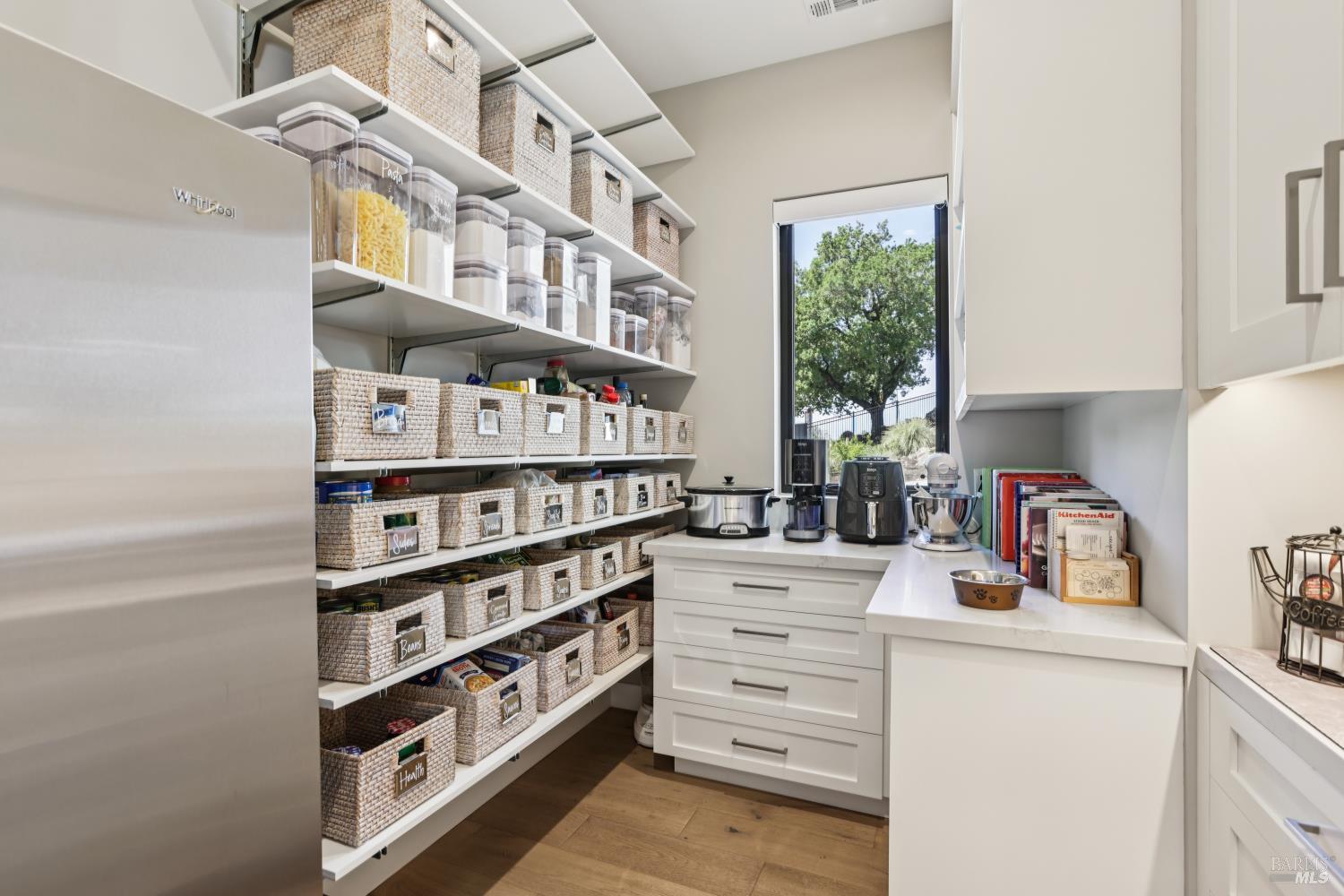 3758 Skyfarm Drive Santa Rosa, CA 95403 - Photo 25 of 80 a kitchen with stainless steel appliances cabinets and a window