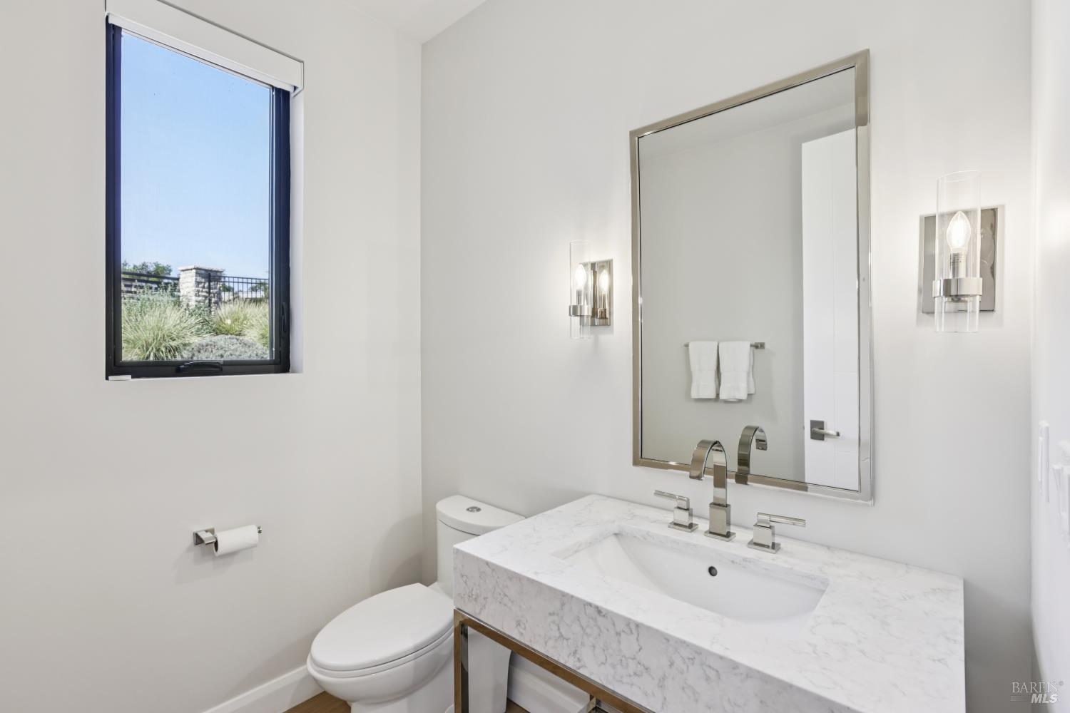 3758 Skyfarm Drive Santa Rosa, CA 95403 - Photo 43 of 80 a bathroom with a sink a toilet and mirror