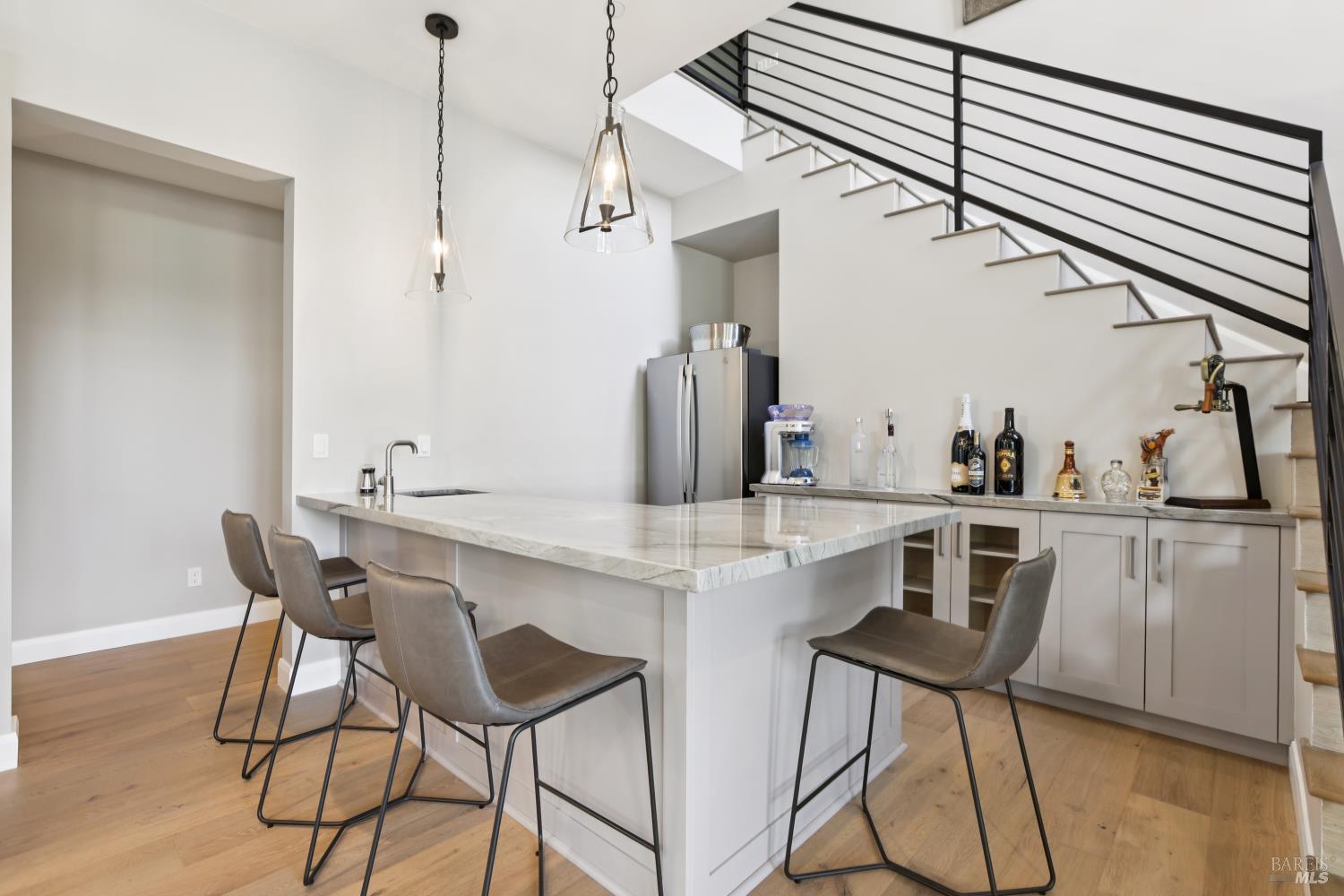 3758 Skyfarm Drive Santa Rosa, CA 95403 - Photo 47 of 80 a kitchen with a table chairs sink and cabinets