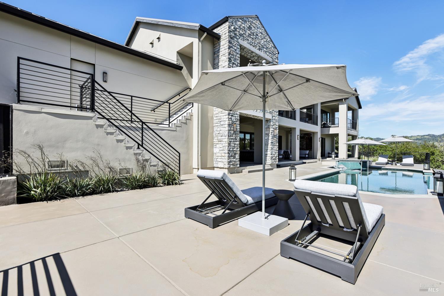 3758 Skyfarm Drive Santa Rosa, CA 95403 - Photo 60 of 80 a view of a terrace with chairs