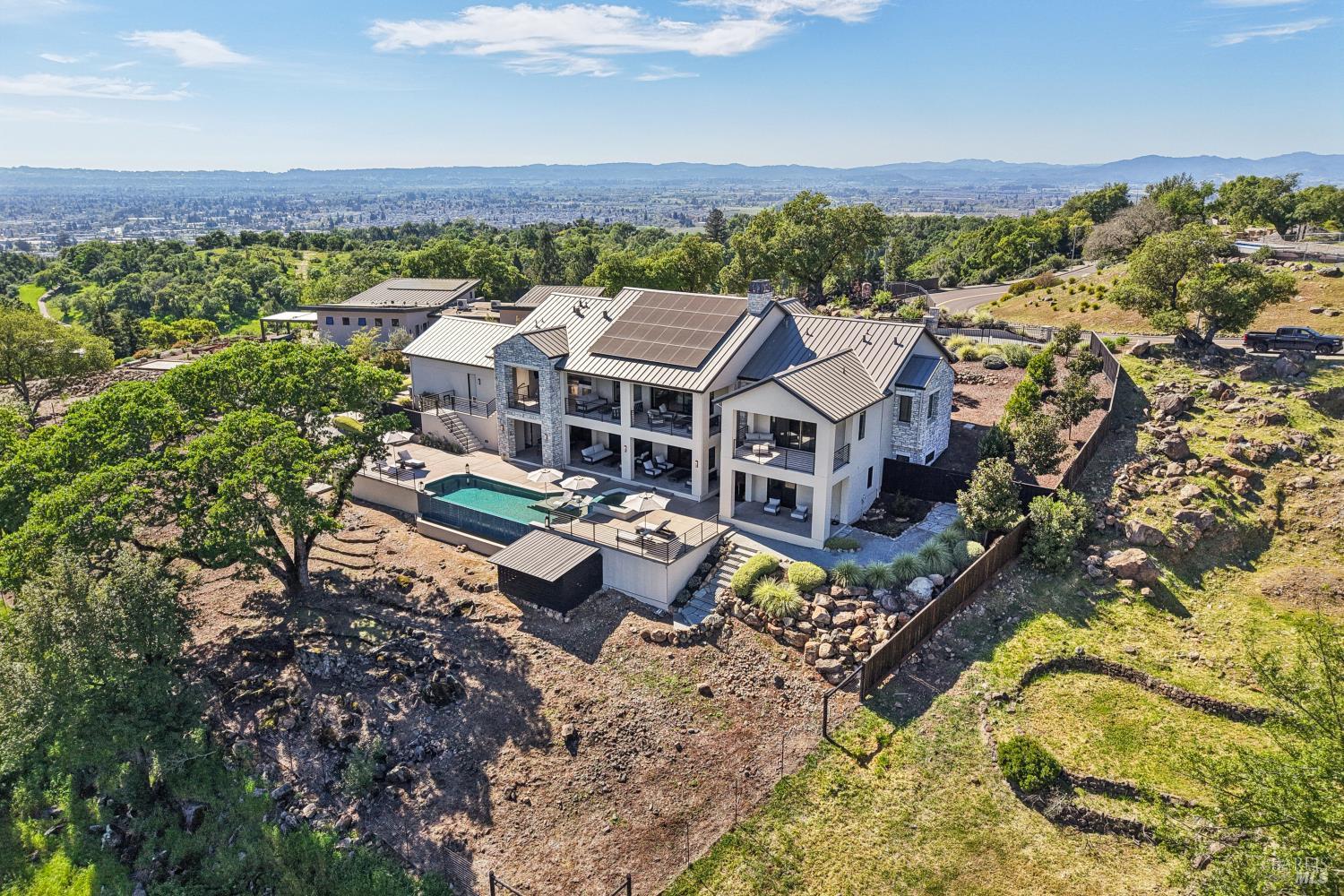3758 Skyfarm Drive Santa Rosa, CA 95403 - Photo 73 of 80 an aerial view of a house with a yard and lake view