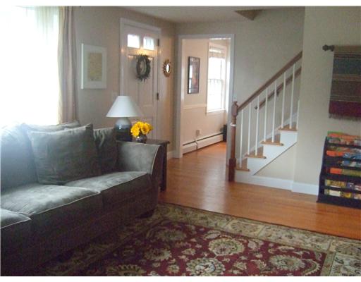 41 Indian Road East Providence, RI 02915 - Photo 7 of 14 Living Room. Sunfilled living room with open bannister