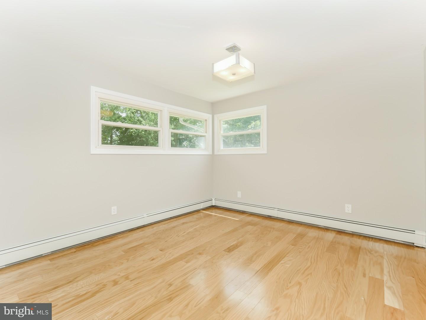 15 St Dunstans Road Hatboro, PA 19040 - Photo 12 of 25 an empty room with a window