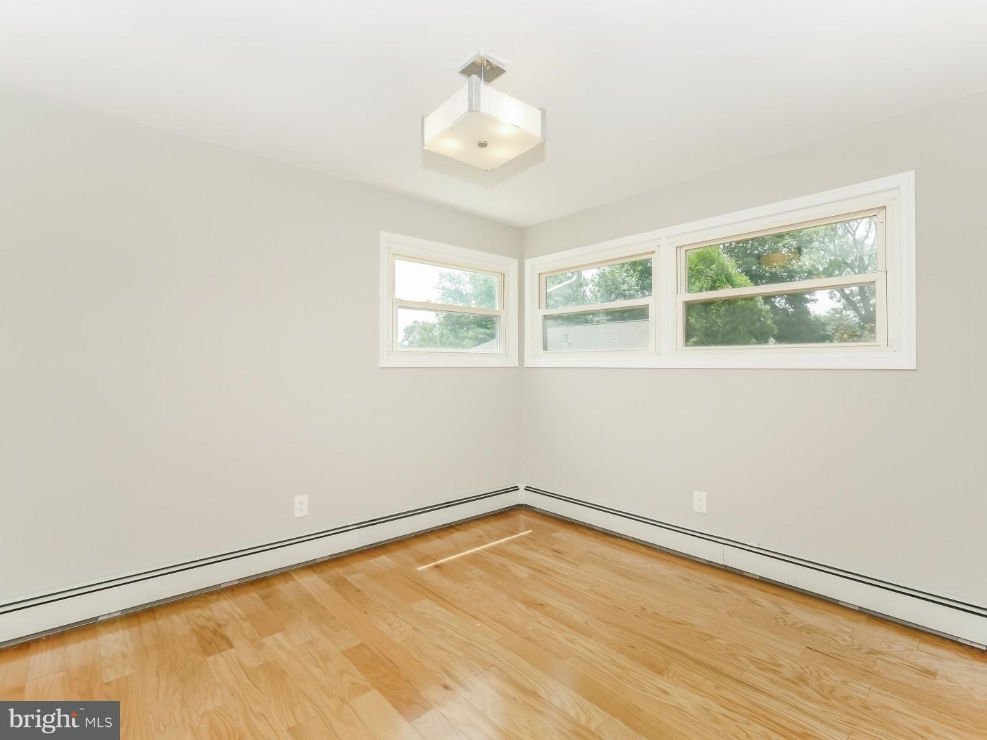 15 St Dunstans Road Hatboro, PA 19040 - Photo 14 of 25 an empty room with a window