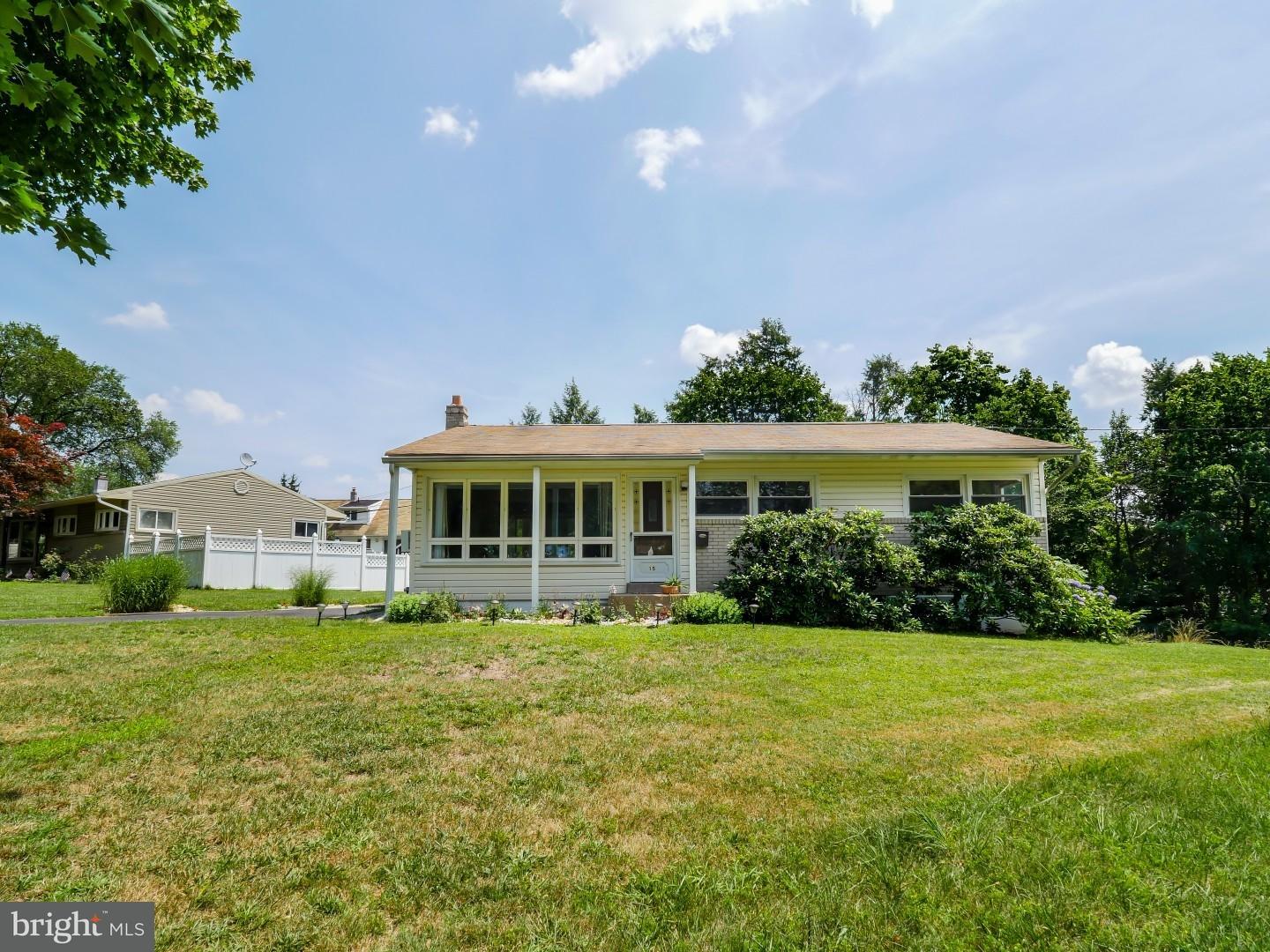 15 St Dunstans Road Hatboro, PA 19040 - Photo 18 of 25 a view of a house with a big yard and potted plants