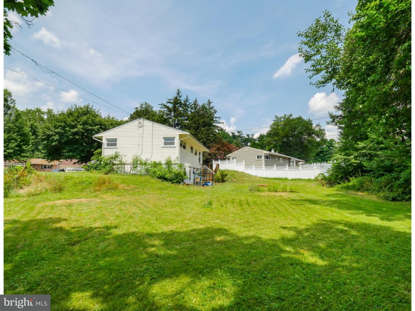 15 St Dunstans Road Hatboro, PA 19040 - Photo 23 of 25 a view of a house with a yard and swimming pool
