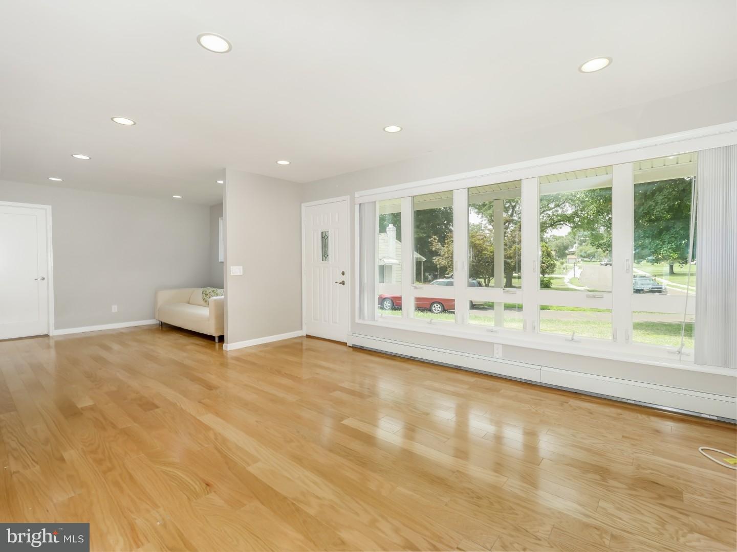 15 St Dunstans Road Hatboro, PA 19040 - Photo 4 of 25 a view of an empty room with a window and a kitchen