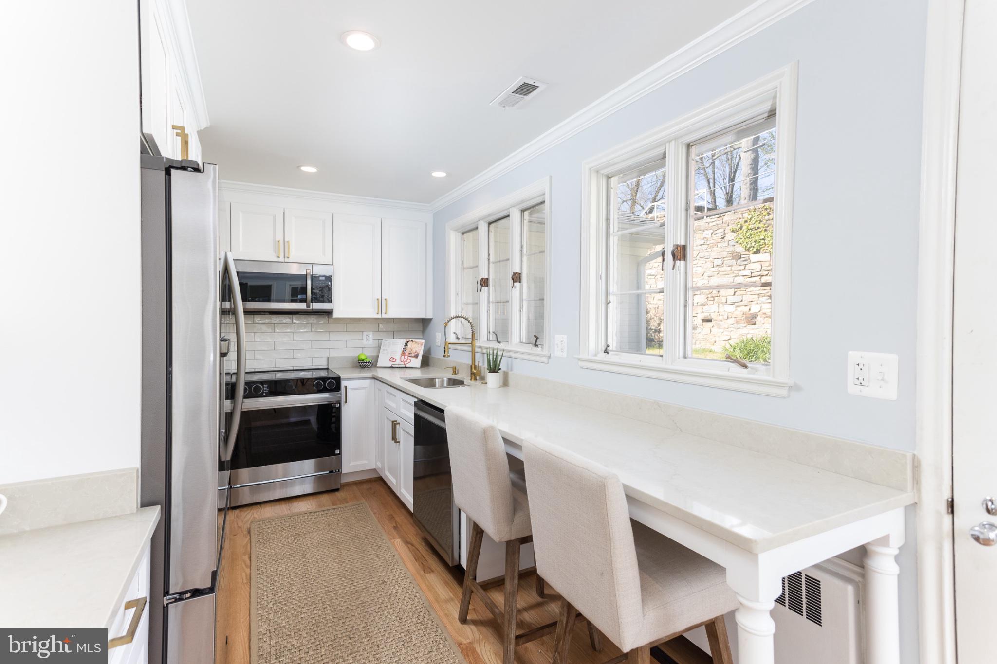 412 Aigburth Road Baltimore, MD 21286 - Photo 6 of 29 Bright and airy modern kitchen space.