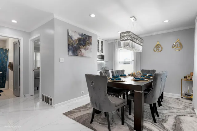 a view of a dining room with furniture