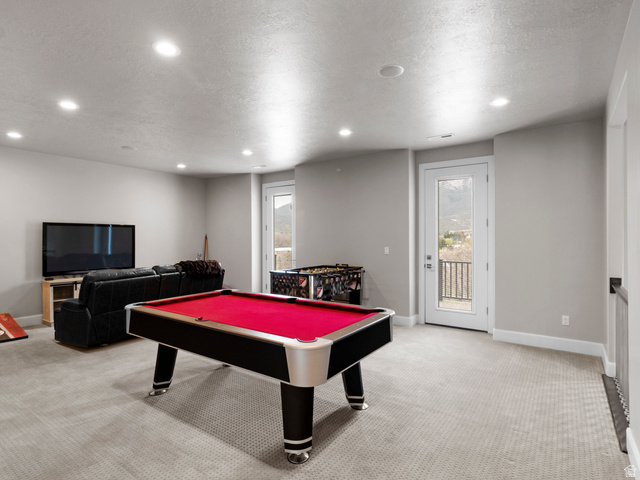 614 East High Lane Alpine, UT 84004 - Photo 66 of 75 Playroom featuring light colored carpet, pool table, recessed lighting, and a textured ceiling