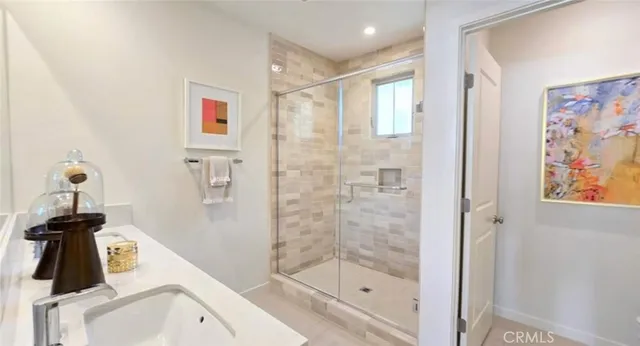 a bathroom with a bathtub and shower