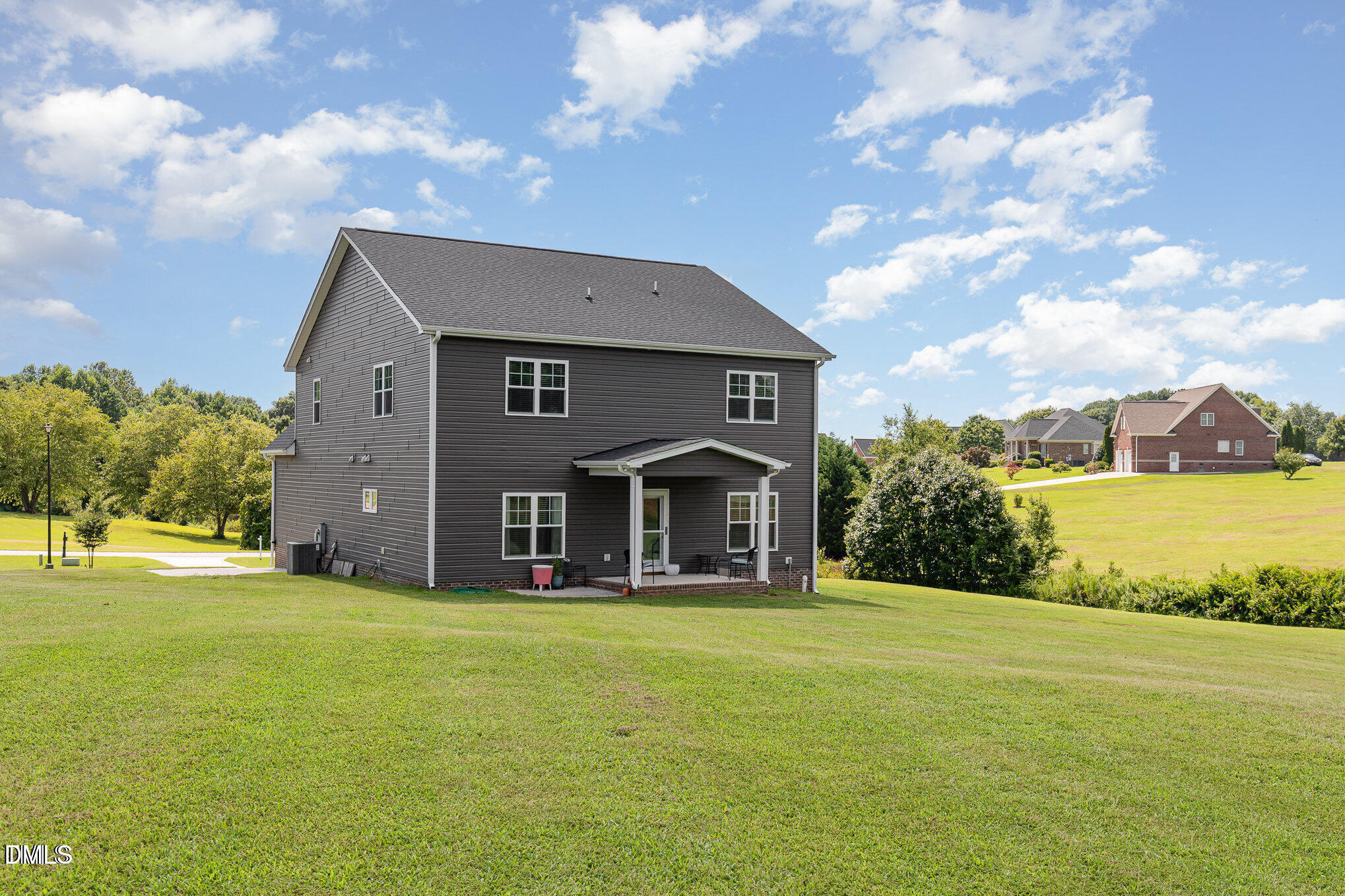8662 Buckhorn Plantation Road Sims, NC 27880 - Photo 25 of 37 a front view of a house with garden