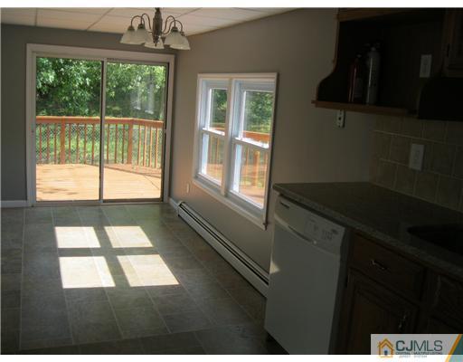 78 Brandywine Road Fords, NJ 08863 - Photo 3 of 13 a view of an empty room with a window