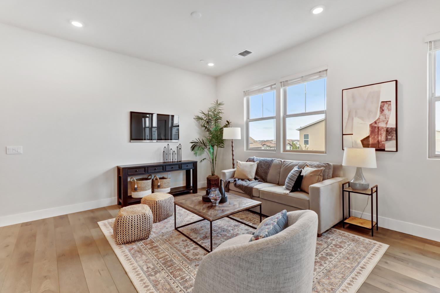 1661 Spring Street, Unit 343 Davis, CA 95616 - Photo 15 of 52 a living room with furniture and a fireplace