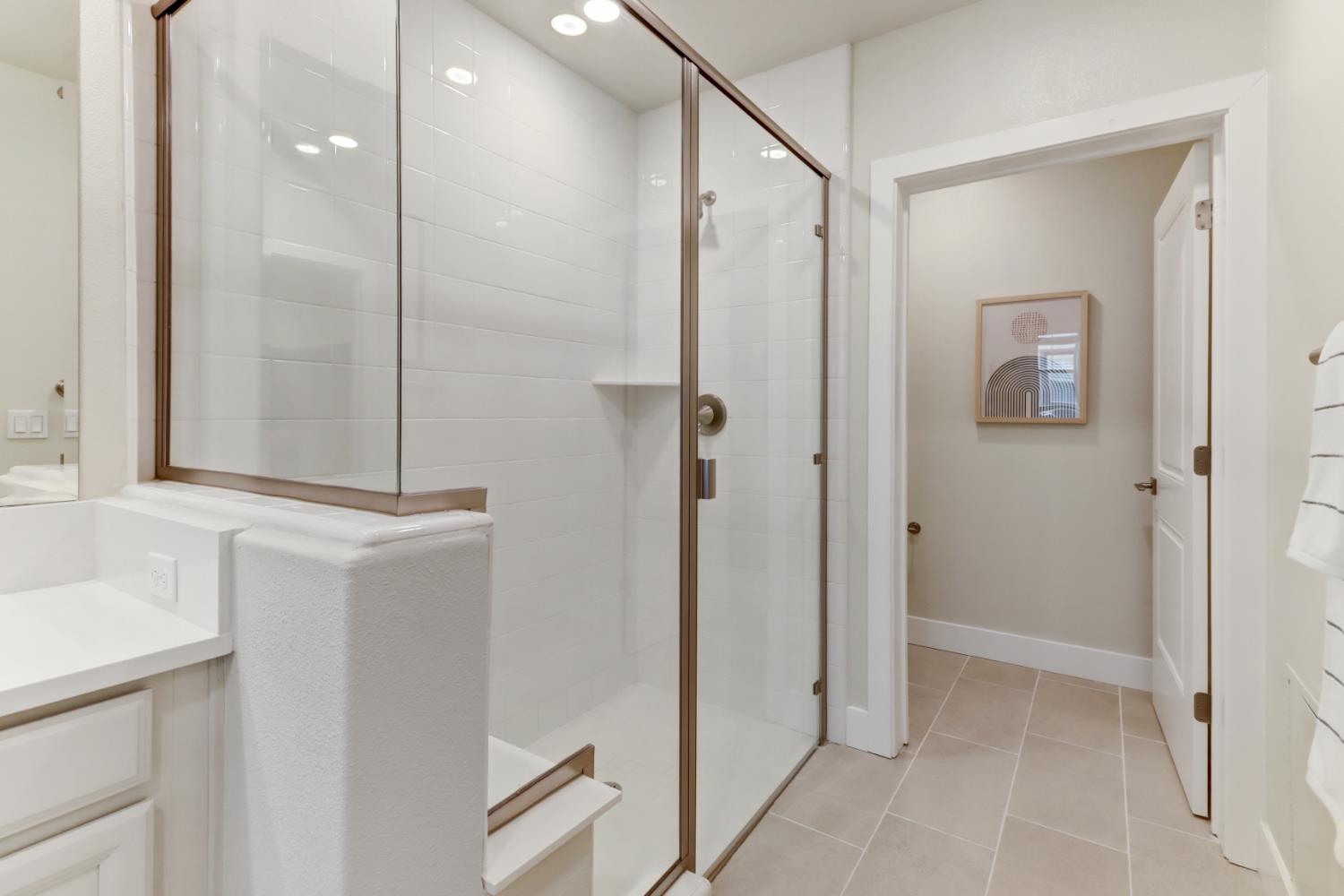 1661 Spring Street, Unit 343 Davis, CA 95616 - Photo 24 of 52 a bathroom with a sink and a mirror