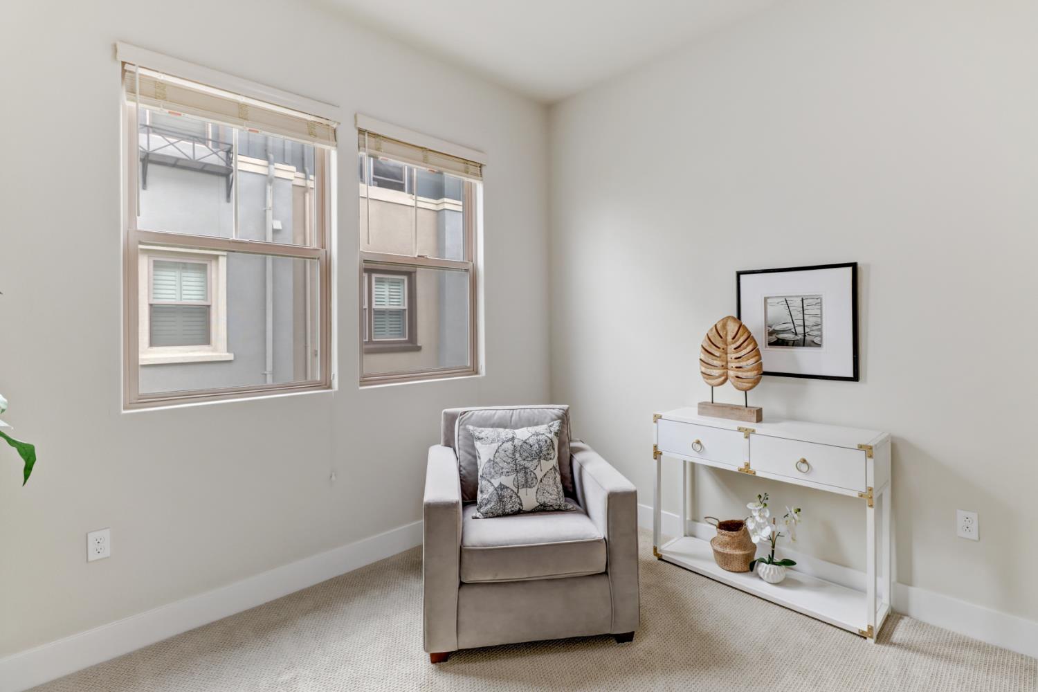 1661 Spring Street, Unit 343 Davis, CA 95616 - Photo 26 of 52 a living room with furniture and a window