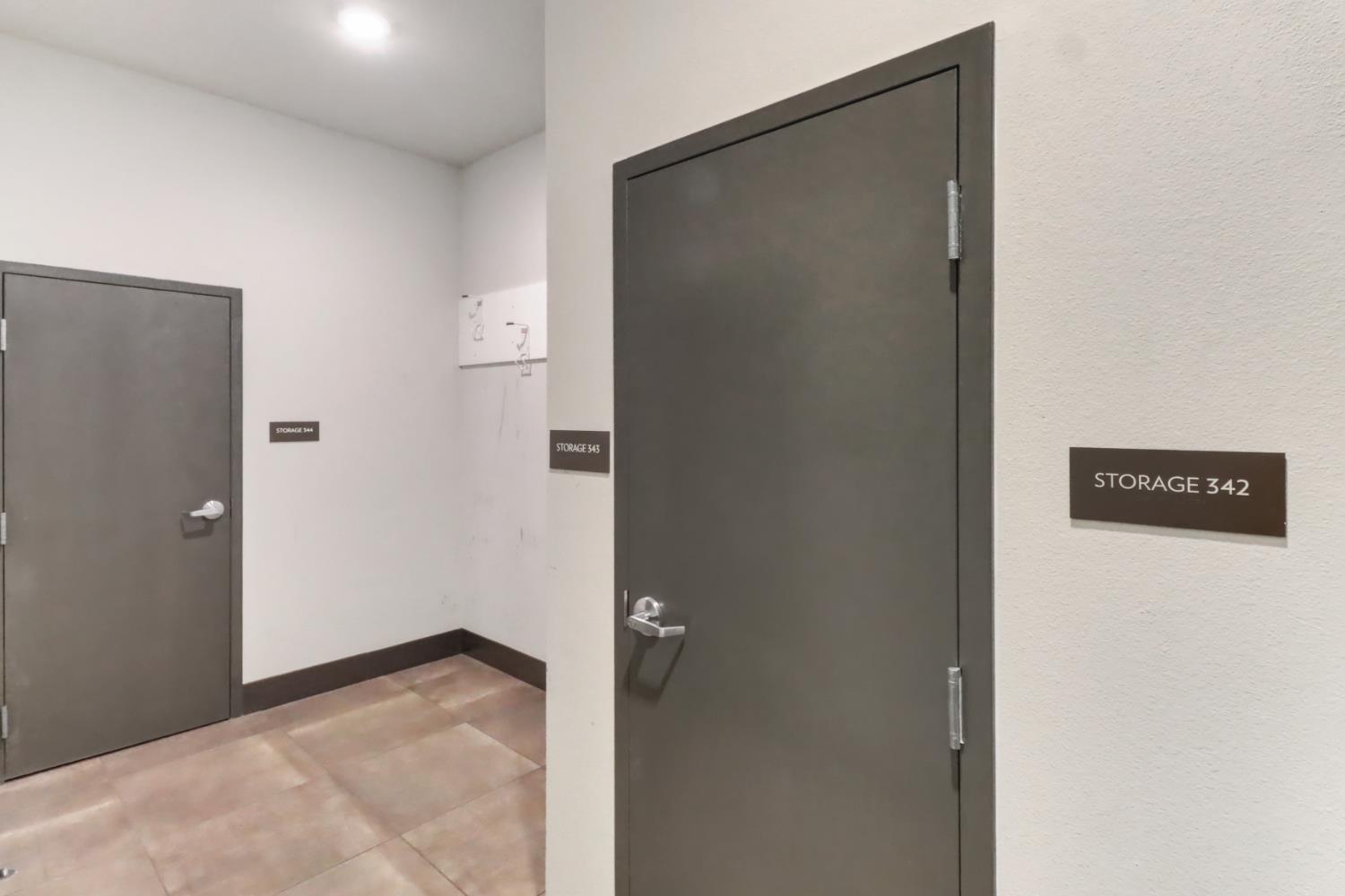 1661 Spring Street, Unit 343 Davis, CA 95616 - Photo 41 of 52 a view of a hallway