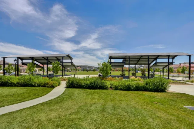 a backyard of a house with lots of green space