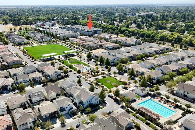 an aerial view of a house with a garden