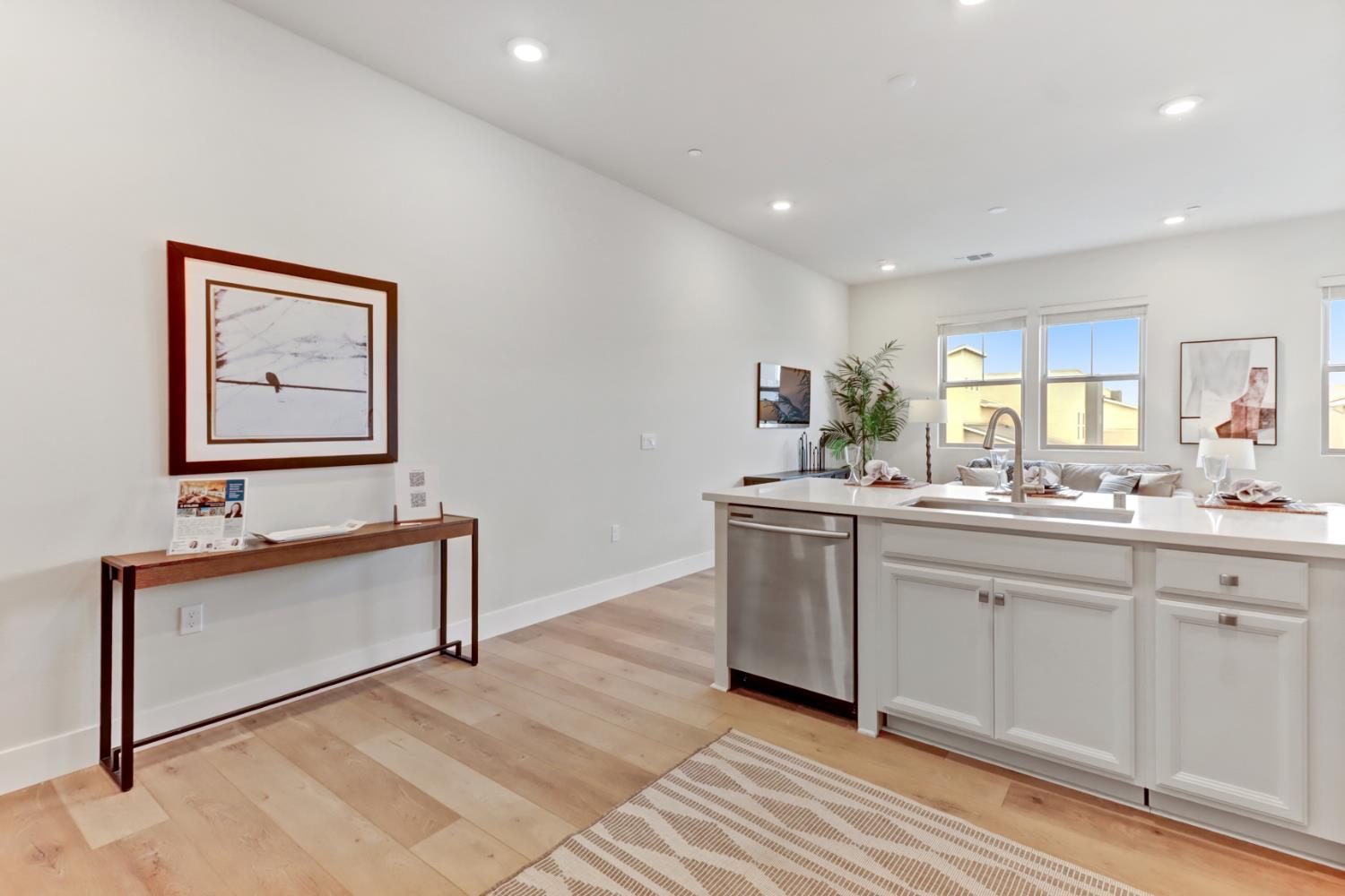 1661 Spring Street, Unit 343 Davis, CA 95616 - Photo 8 of 52 a spacious bathroom with a double vanity sink and a mirror