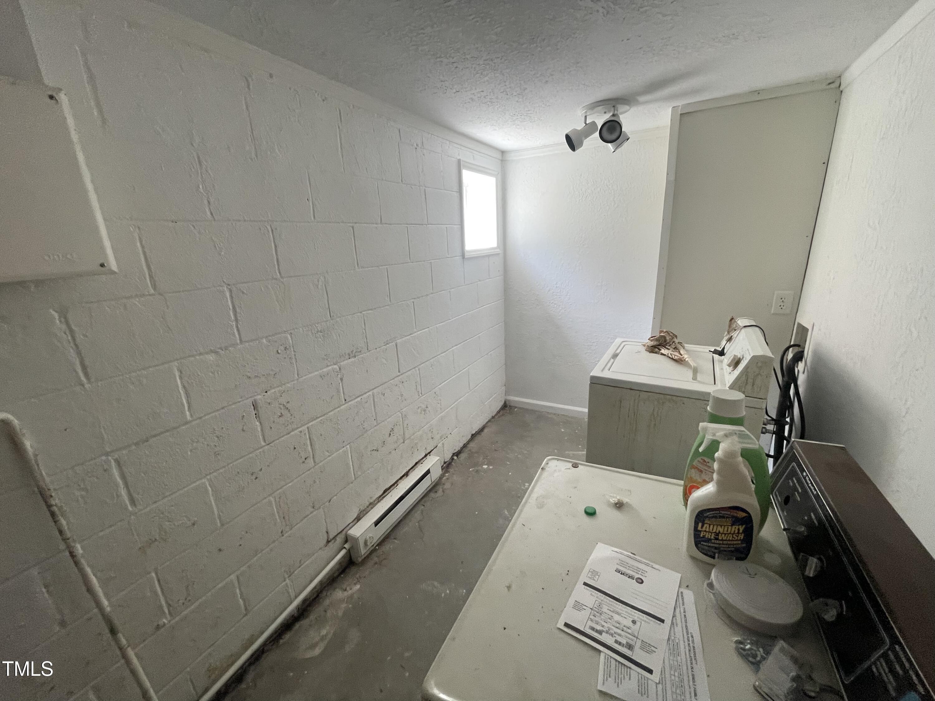 626 Middle Street Durham, NC 27703 - Photo 17 of 42 a bathroom with a sink toilet and shower