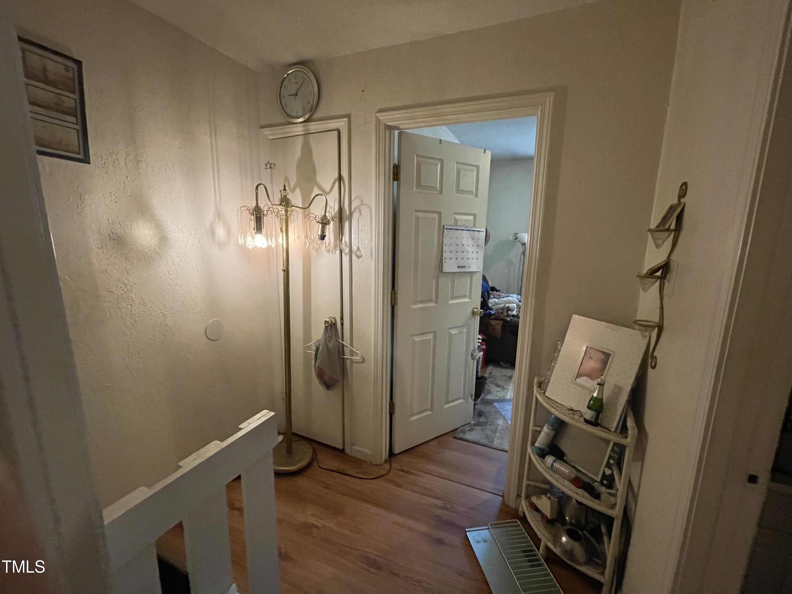 626 Middle Street Durham, NC 27703 - Photo 27 of 42 a view of a hallway with wooden floor and closet