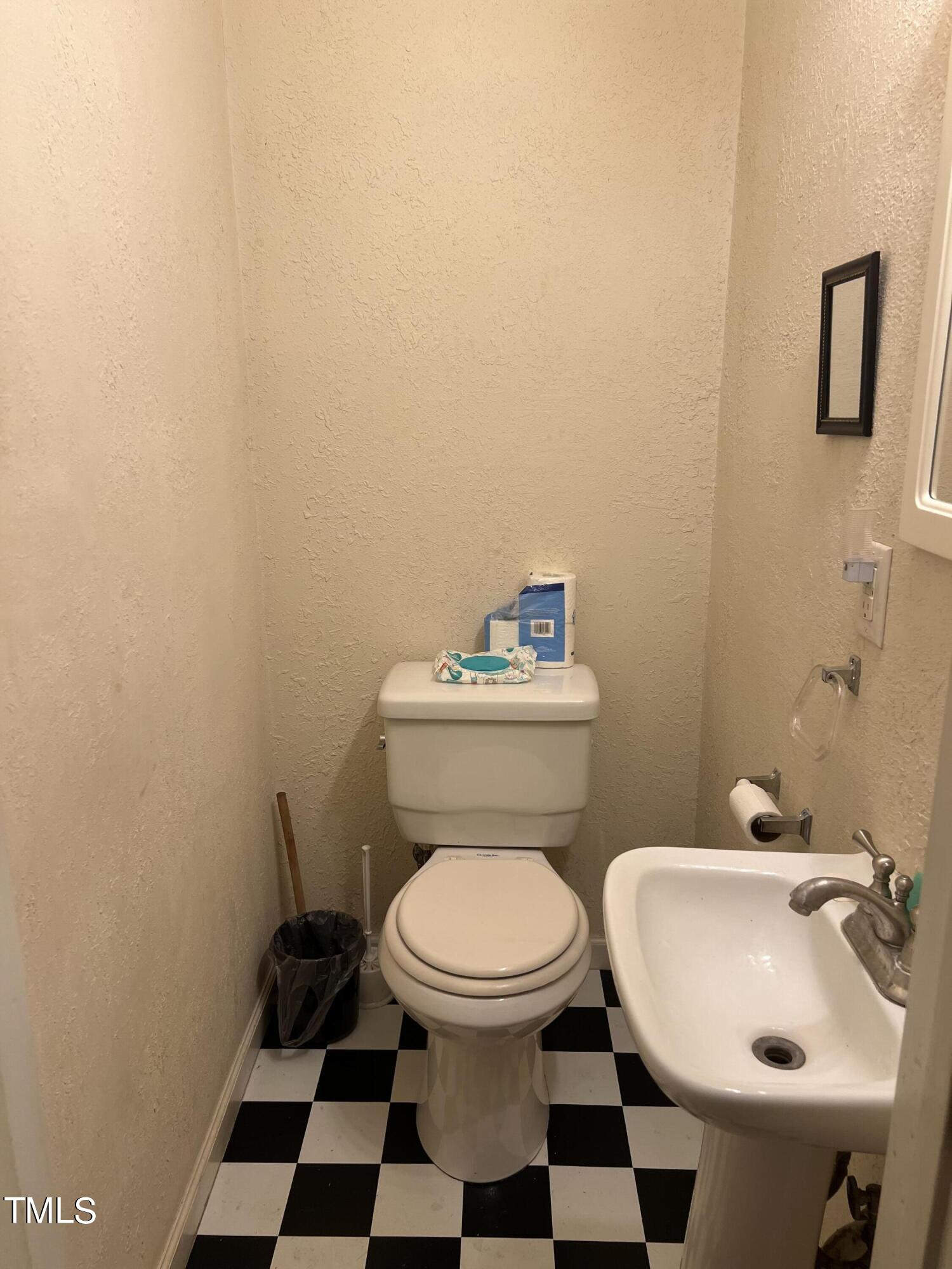 626 Middle Street Durham, NC 27703 - Photo 5 of 42 a bathroom with a sink and a toilet