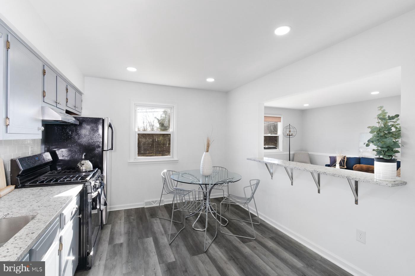 510 Davis Road Barrington, NJ 08007 - Photo 11 of 29 a living room with furniture a wooden floor and a flat screen tv