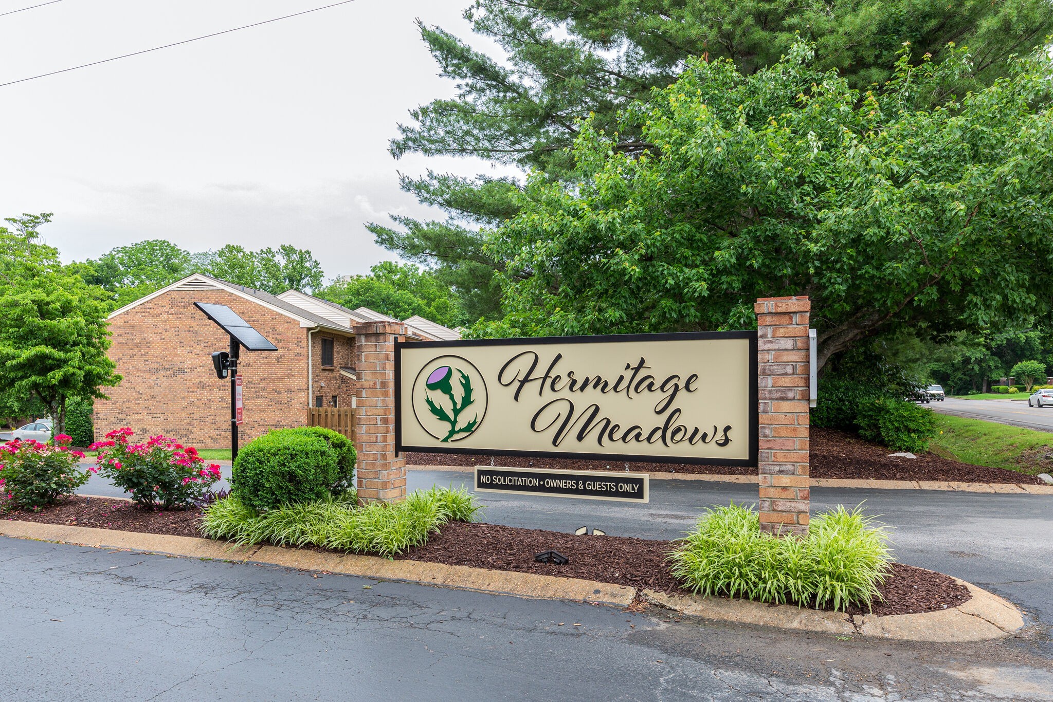 129 Thistle Lane Hermitage, TN 37076 - Photo 2 of 22 a sign on the side of a road