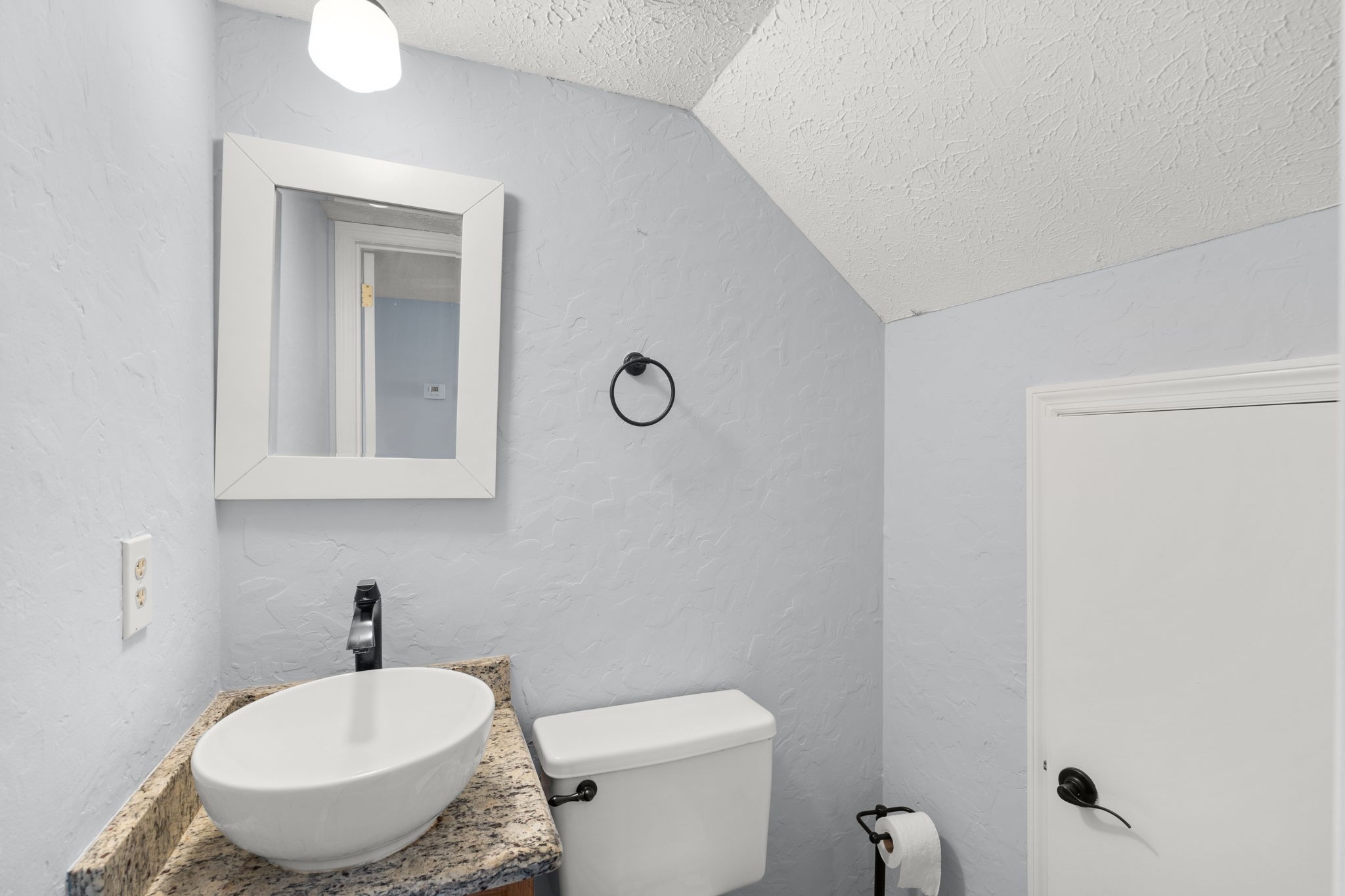 129 Thistle Lane Hermitage, TN 37076 - Photo 7 of 22 a bathroom with a toilet sink and mirror
