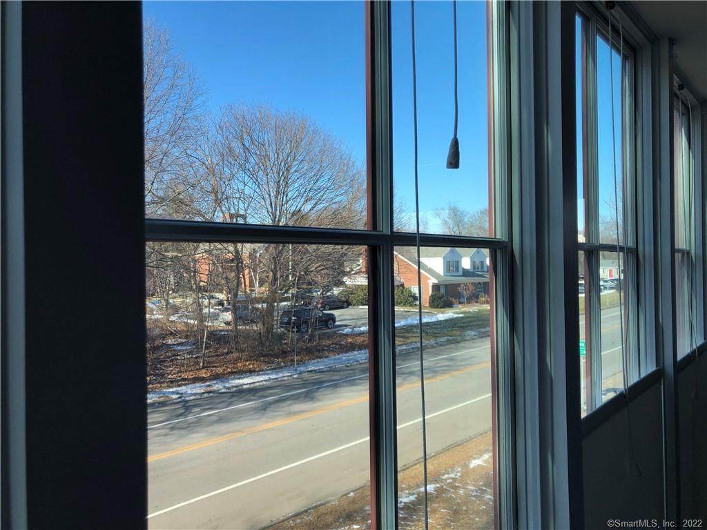 22 Durham Road, Unit A2 Madison, CT 06443 - Photo 7 of 22 a view of a glass door with a from balcony