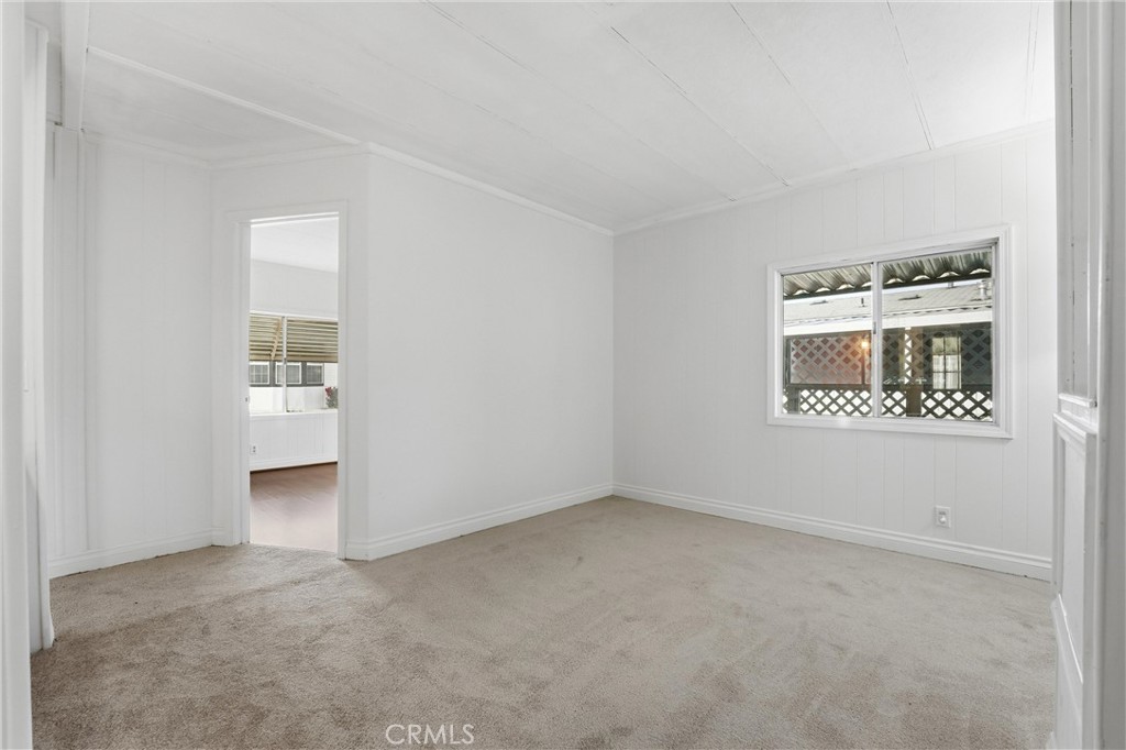 4901 Green River Road, Unit 140 Corona, CA 92878 - Photo 17 of 21 a view of an empty room with a window