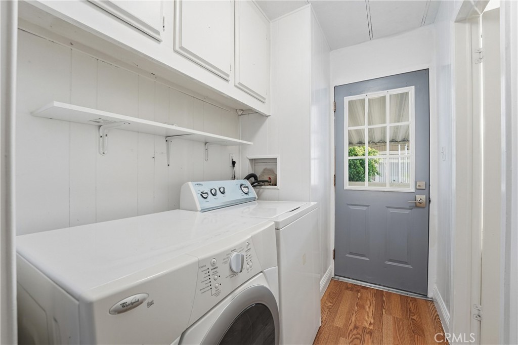 4901 Green River Road, Unit 140 Corona, CA 92878 - Photo 19 of 21 a utility room with dryer and washer