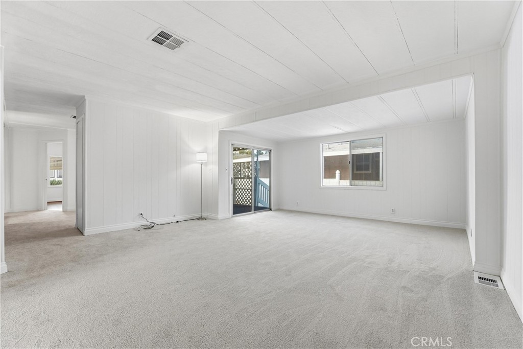 4901 Green River Road, Unit 140 Corona, CA 92878 - Photo 5 of 21 an empty room with windows and closet