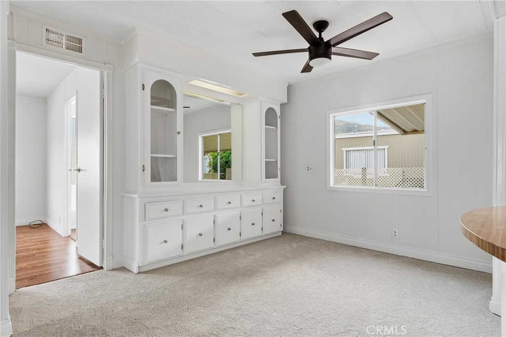 4901 Green River Road, Unit 140 Corona, CA 92878 - Photo 6 of 21 a view of an empty room with a window