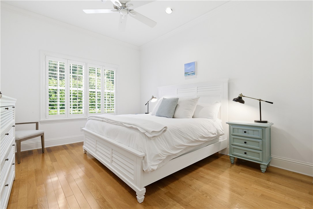 2116 Cavalla Road Vero Beach, FL 32963 - Photo 12 of 23 a bedroom with a bed dresser and a window