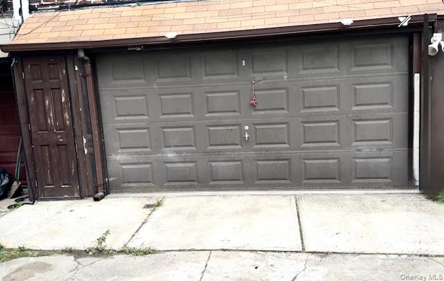 45-47 43rd Street Queens, NY 11104 - Photo 24 of 26 Garage featuring driveway
