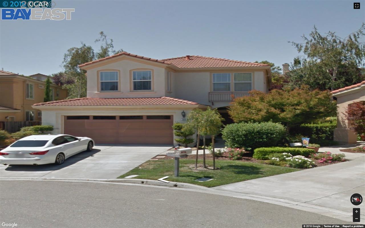 a car parked in front of a house