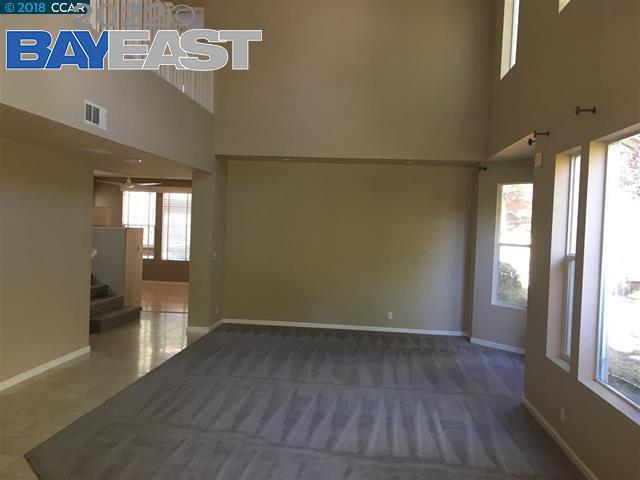 221 Azalea Lane San Ramon, CA 94582 - Photo 3 of 4 wooden floor in an empty room with a window