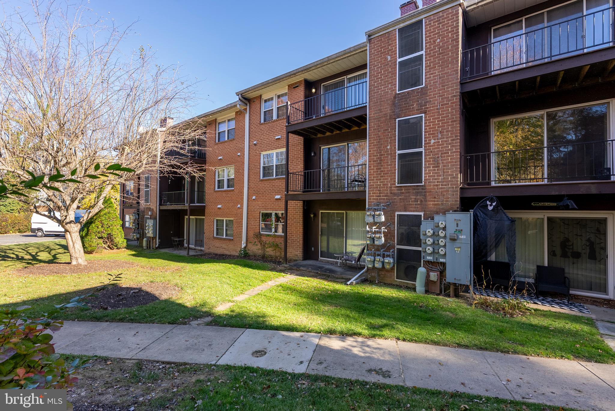 240 Crocker Drive, Unit 240F Bel Air, MD 21014 - Photo 35 of 38 a view of a building with a yard