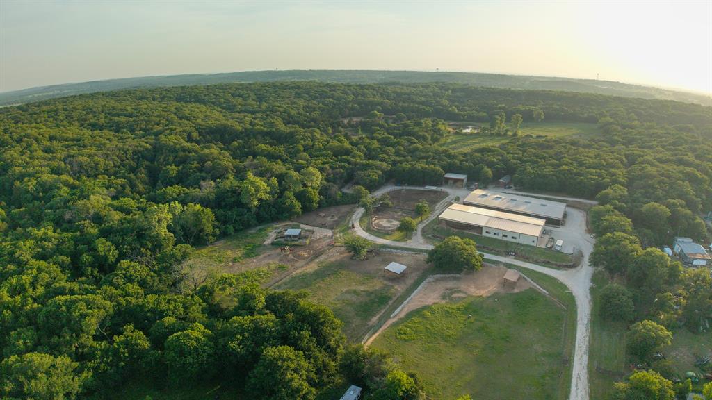 8016 Highway 82 Gainesville, TX 76240 - Photo 1 of 24 an aerial view of a house with a yard