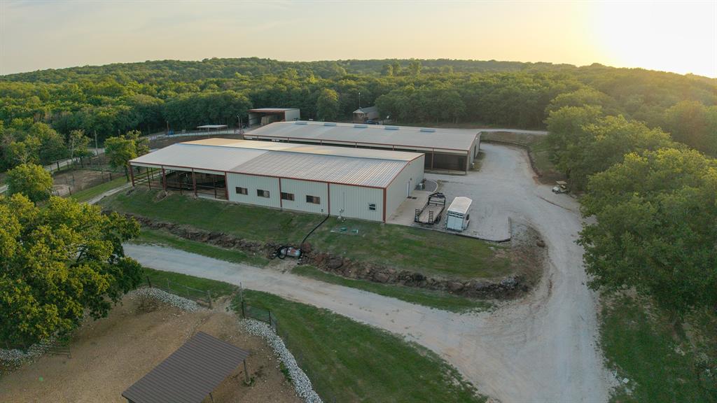 8016 Highway 82 Gainesville, TX 76240 - Photo 4 of 24 an aerial view of a house