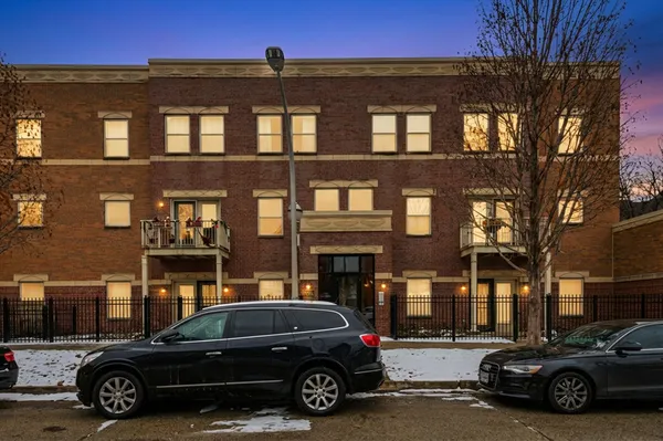 a car parked in front of a building