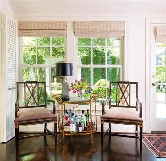 a dining room with furniture mountain view and wooden floor