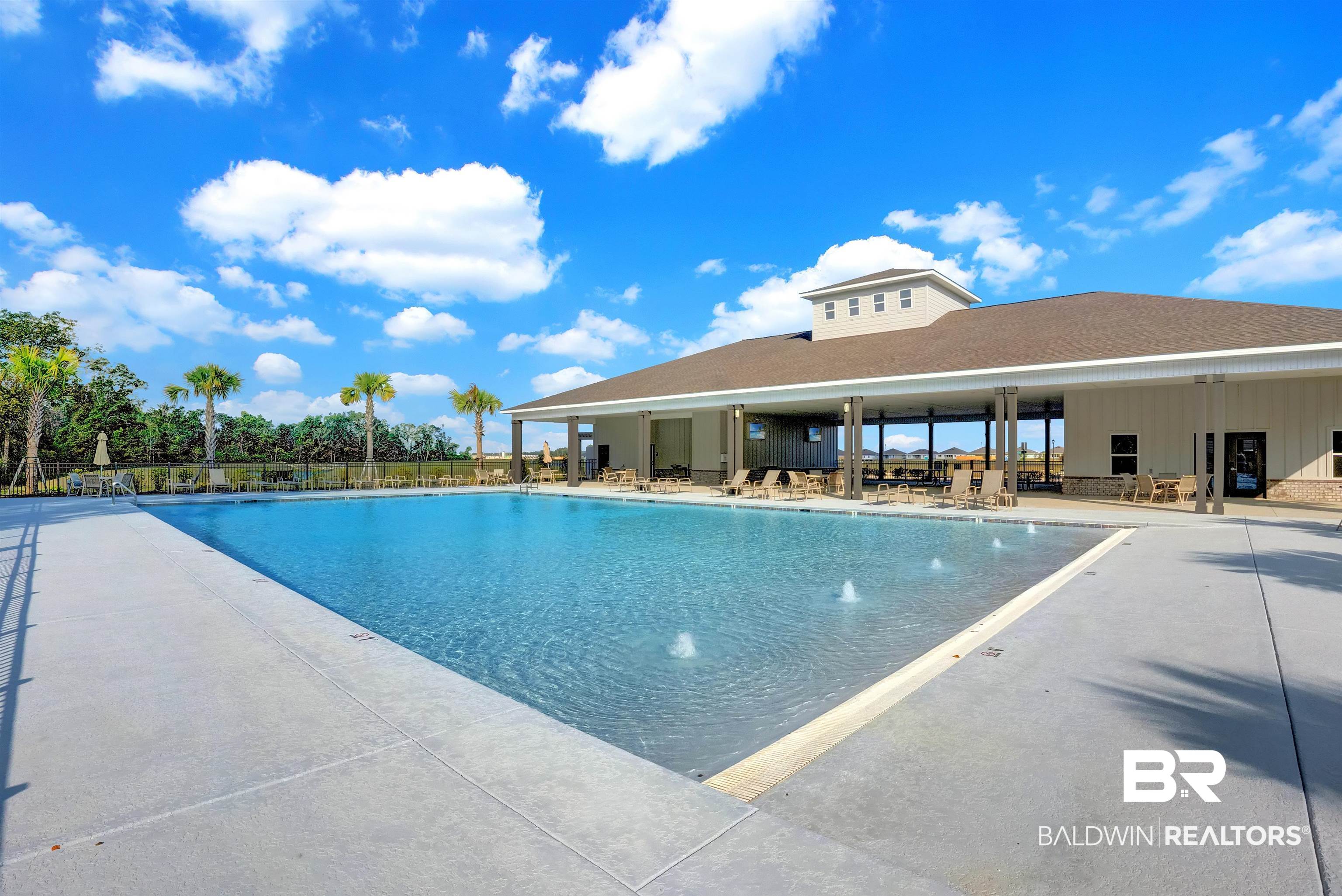 22227 Aleutian Avenue Foley, AL 36535 - Photo 34 of 64 View of swimming pool with a patio